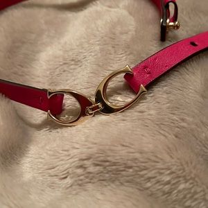Coach fuchsia leather bracelet.